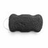 Flat, porous underside of a black konjac body sponge with a white hanging string on a white background.